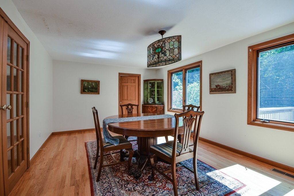 41 Garvey Road Framingham, MA 01701 - Photo 10 of 22 a view of a dining room with furniture window and wooden floor