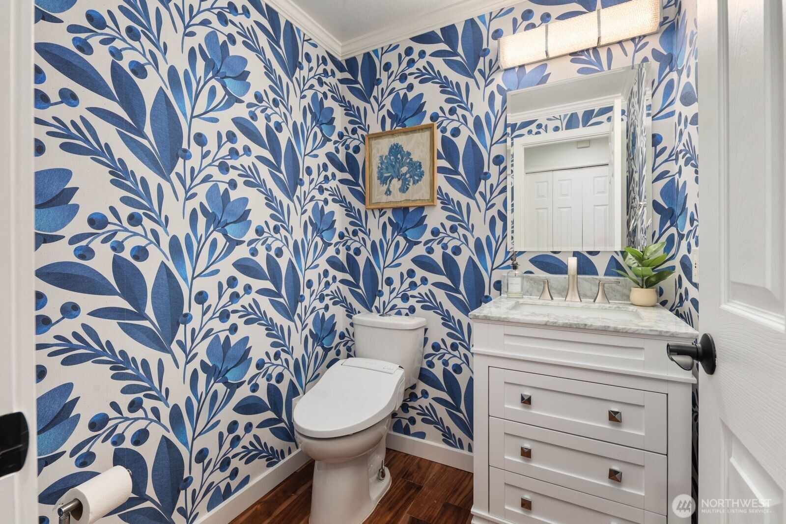 1947 Northeast 23rd Street Renton, WA 98056 - Photo 19 of 36 a bathroom with a toilet and a sink