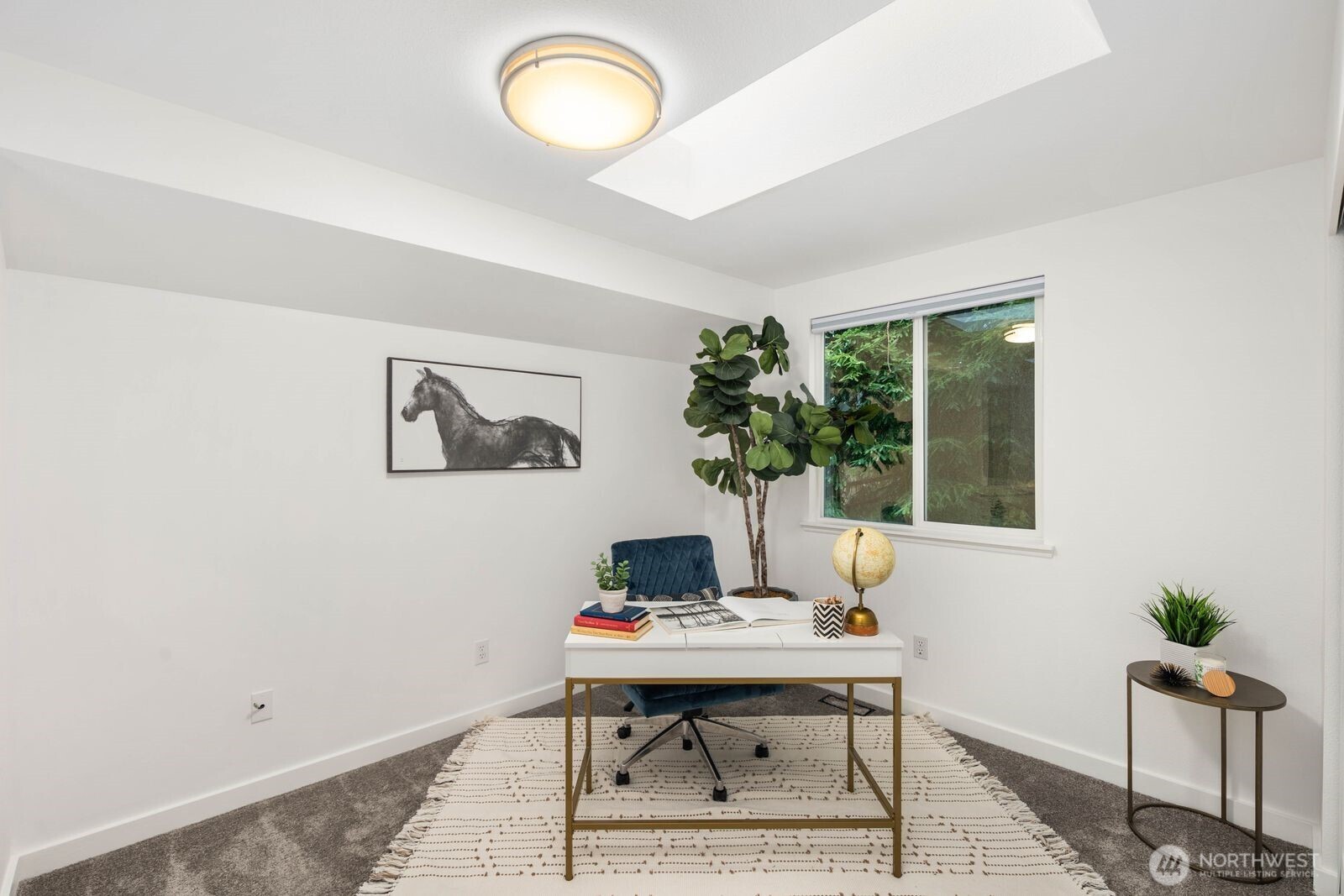 1947 Northeast 23rd Street Renton, WA 98056 - Photo 21 of 36 a living room with furniture and a potted plant