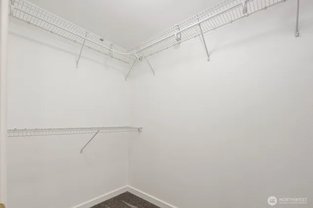 a view of a room with racks on the wall