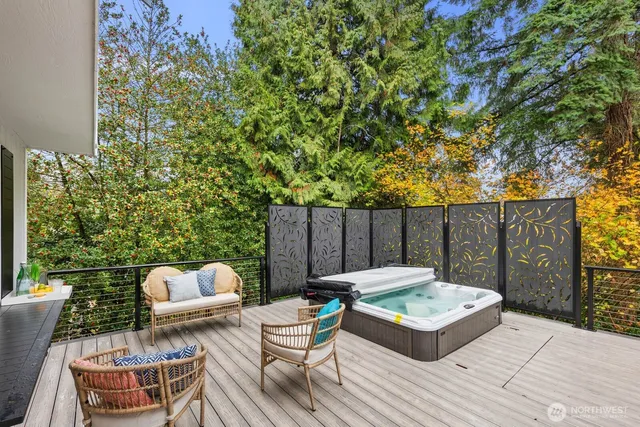 a view of a chairs and table in the patio
