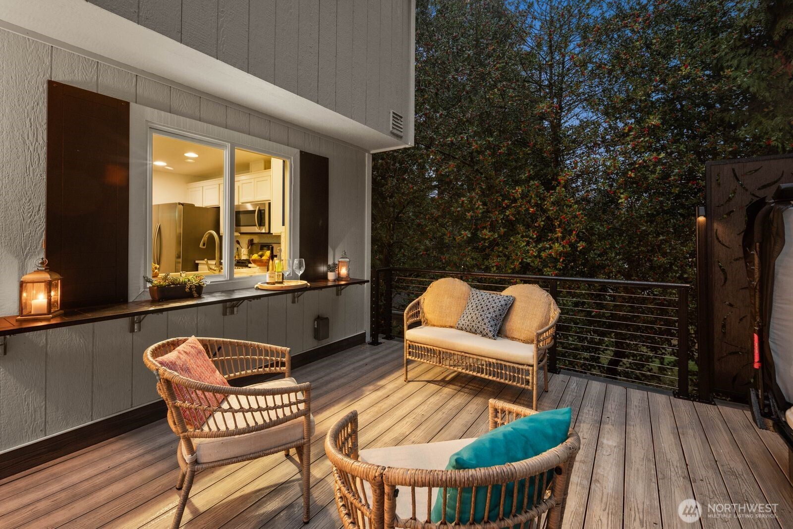 1947 Northeast 23rd Street Renton, WA 98056 - Photo 32 of 36 a balcony with table and chairs