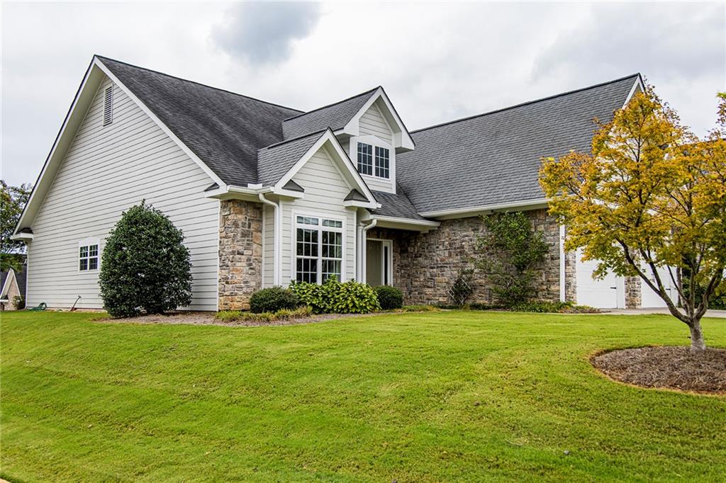 118 Carriage Way Southeast Rome, GA 30161 - Photo 1 of 1 a front view of a house with a yard