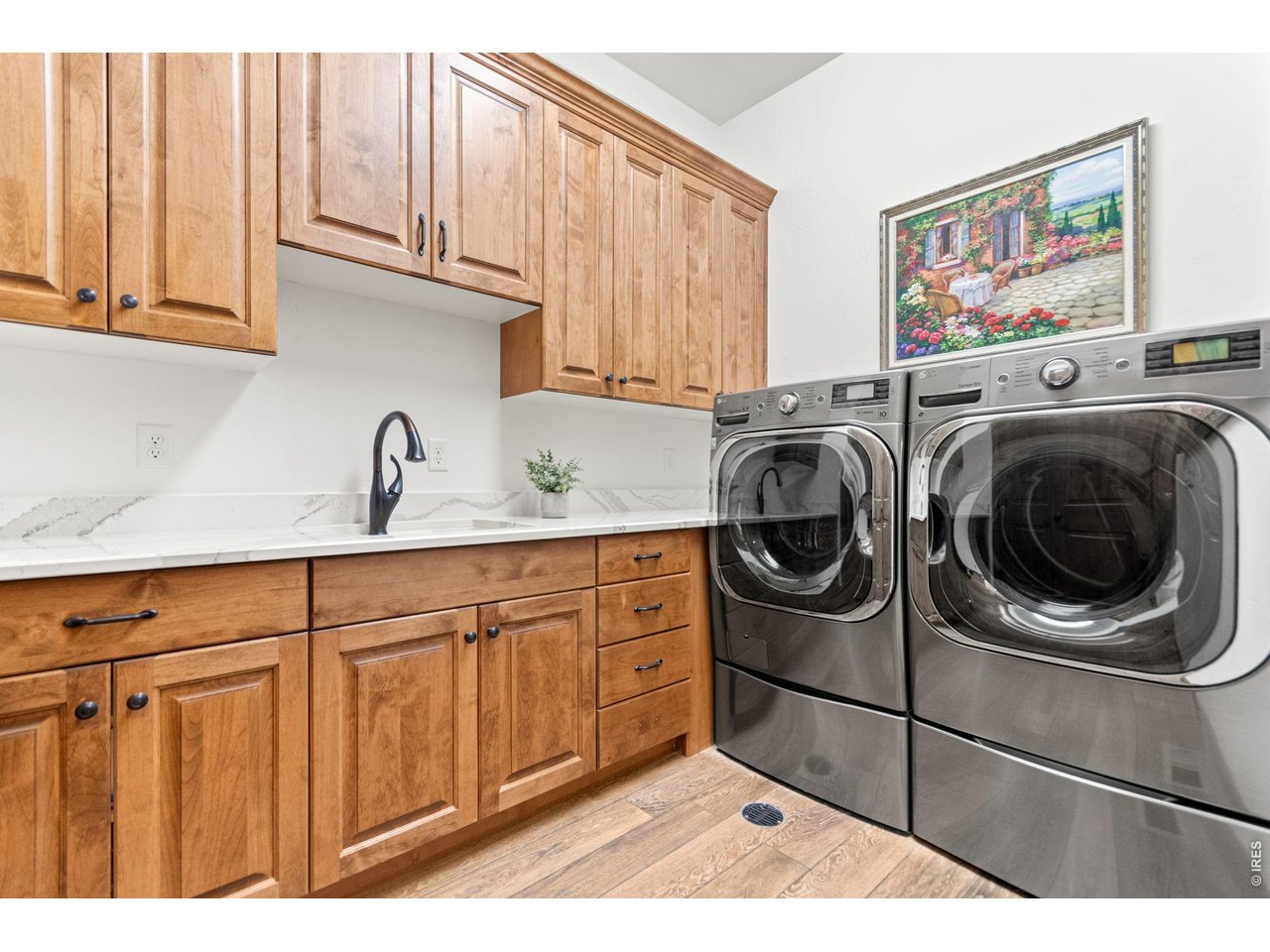 9567 Poppy Way Arvada, CO 80007 - Photo 27 of 48 a utility room with sink dryer and washer