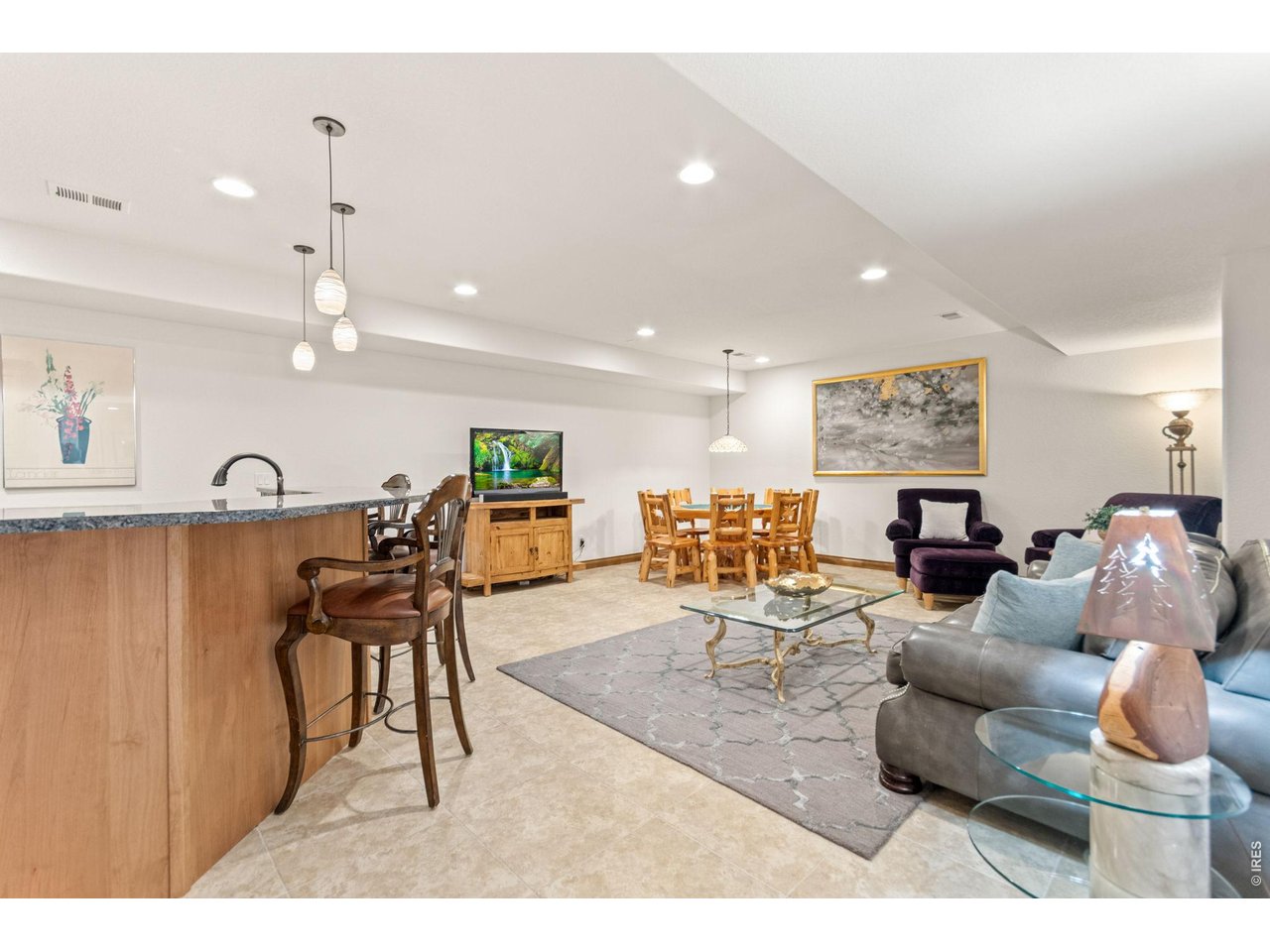 9567 Poppy Way Arvada, CO 80007 - Photo 33 of 48 a living room with furniture and a large window