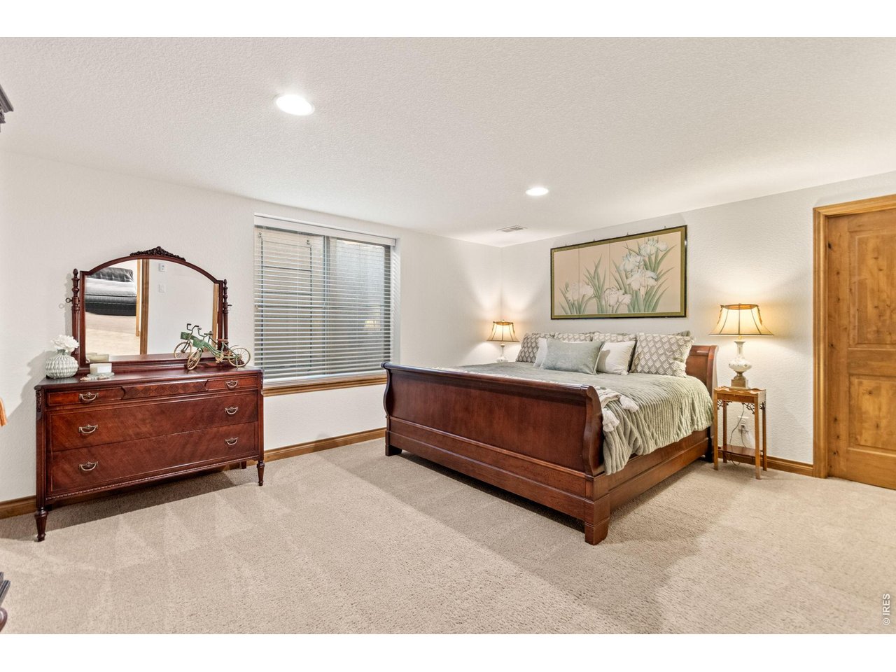 9567 Poppy Way Arvada, CO 80007 - Photo 38 of 48 a bedroom with a bed and window