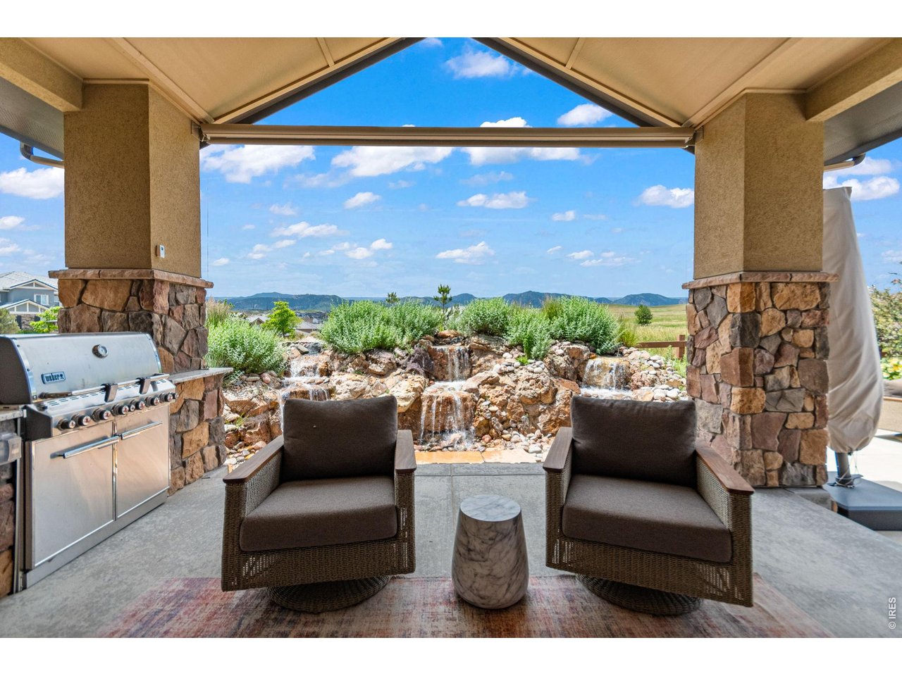 9567 Poppy Way Arvada, CO 80007 - Photo 41 of 48 a view of living room filled with furniture and a floor to ceiling window