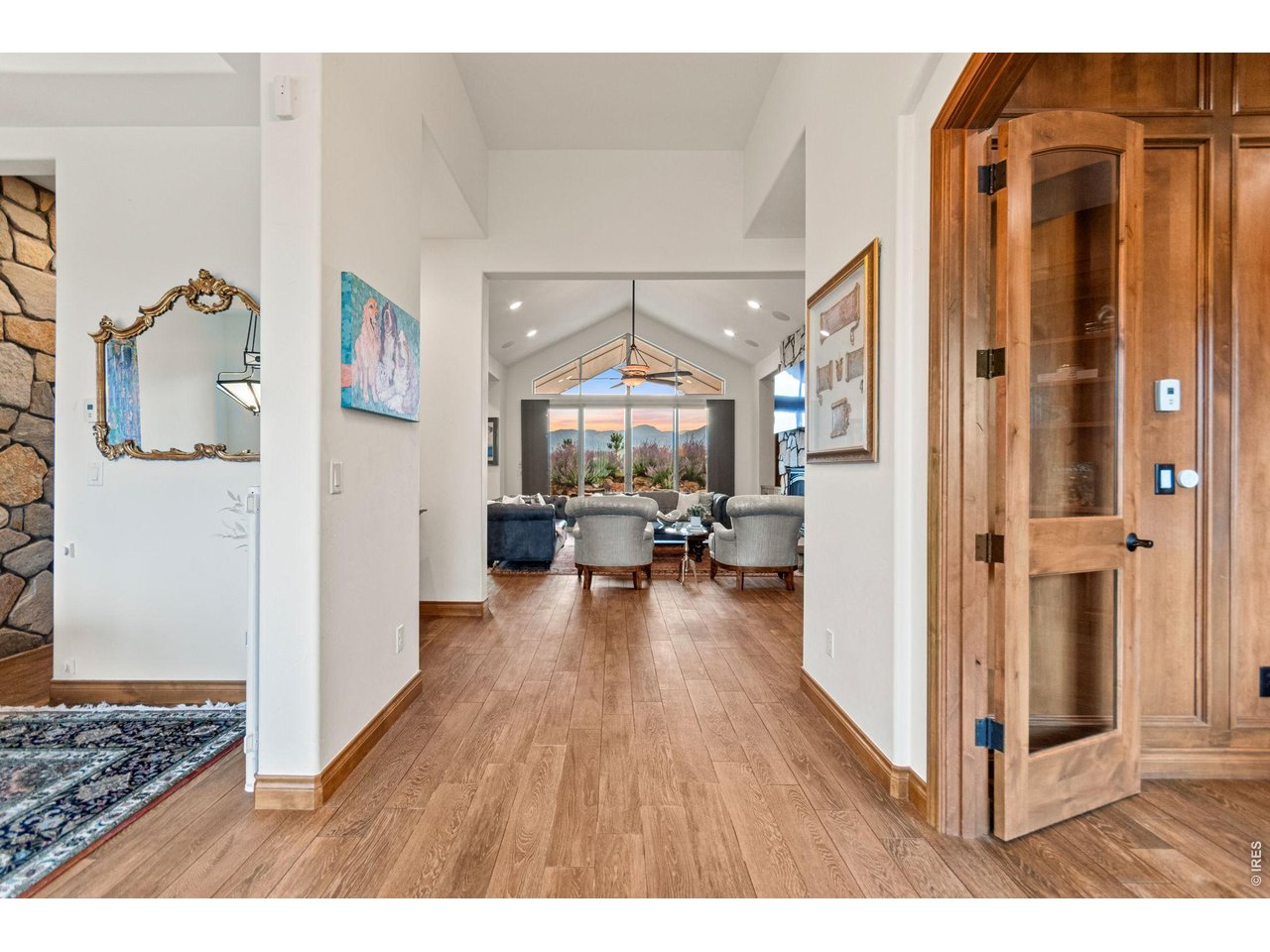 9567 Poppy Way Arvada, CO 80007 - Photo 5 of 48 a living room with furniture and a chandelier