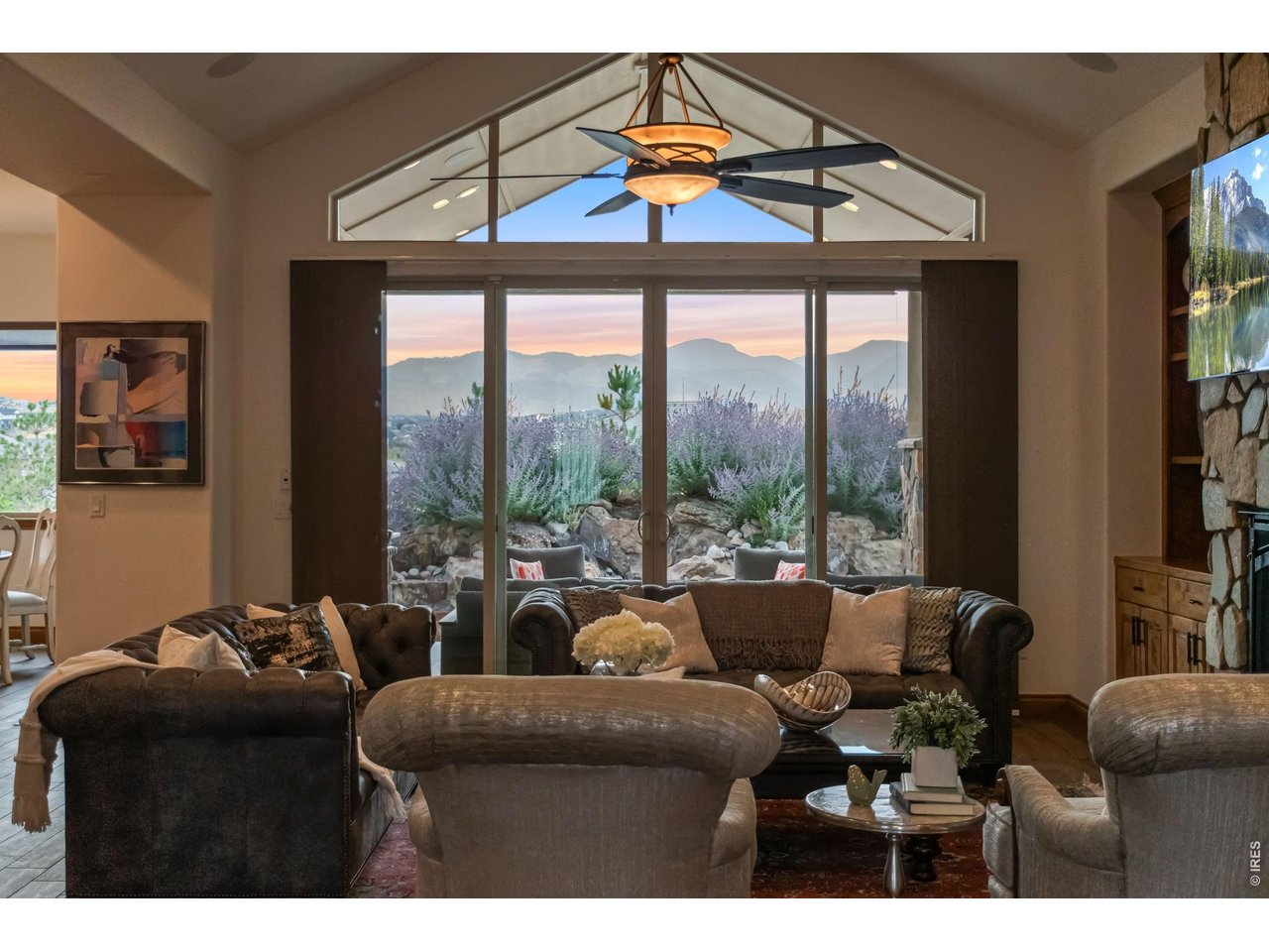 9567 Poppy Way Arvada, CO 80007 - Photo 6 of 48 a living room with furniture and a floor to ceiling window