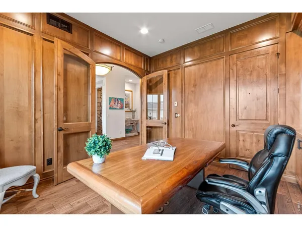 a room with furniture and wooden door