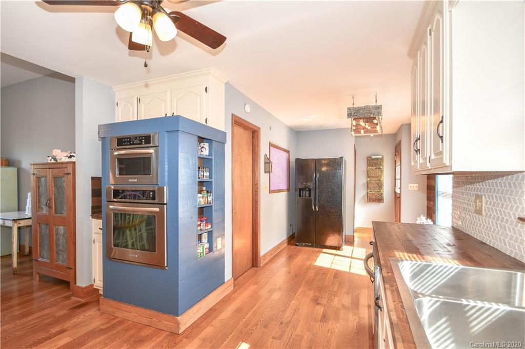 1408 Mills Harris Road Wingate, NC 28174 - Photo 14 of 23 a view of a kitchen from the hallway
