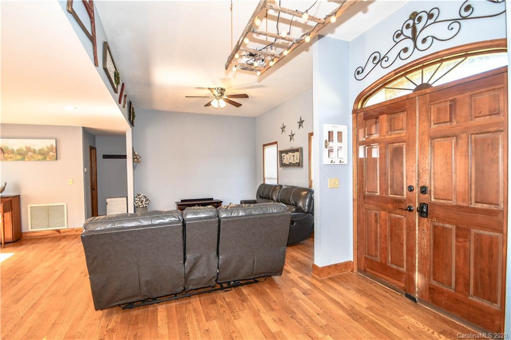 1408 Mills Harris Road Wingate, NC 28174 - Photo 3 of 23 a living room with furniture and a window