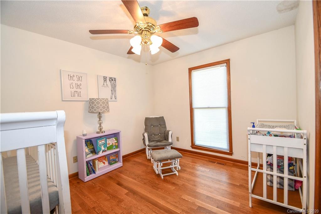 1408 Mills Harris Road Wingate, NC 28174 - Photo 21 of 23 a living room with furniture and a window