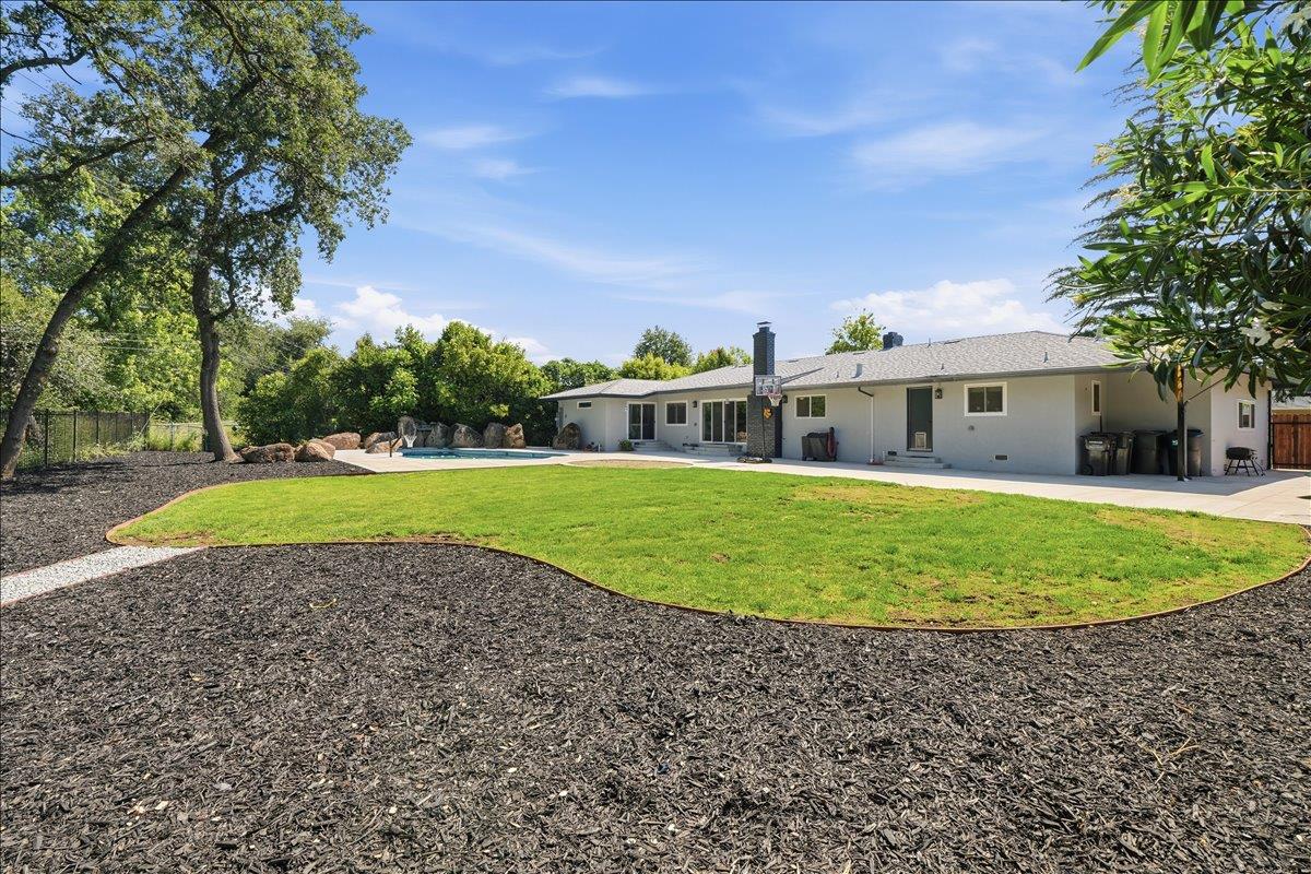 4849 Alexon Way Carmichael, CA 95608 - Photo 39 of 50 a view of outdoor space yard and green space