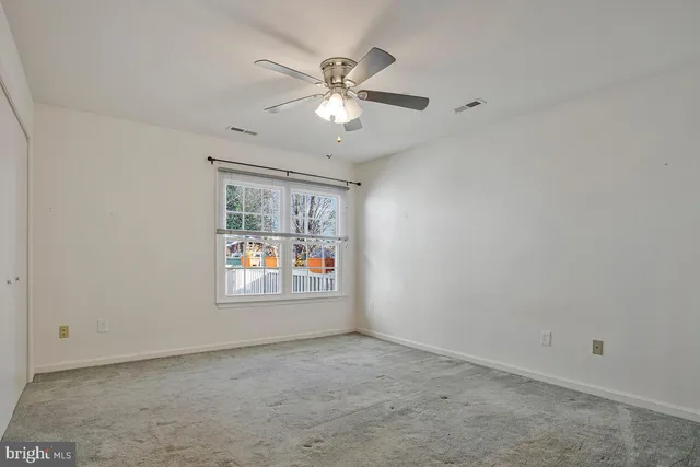 a bathroom with a sink toilet and vanity