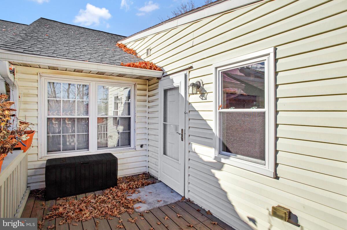 9264 Cherry Lane, Unit 47 Laurel, MD 20708 - Photo 30 of 32 a view of a house with a barbeque