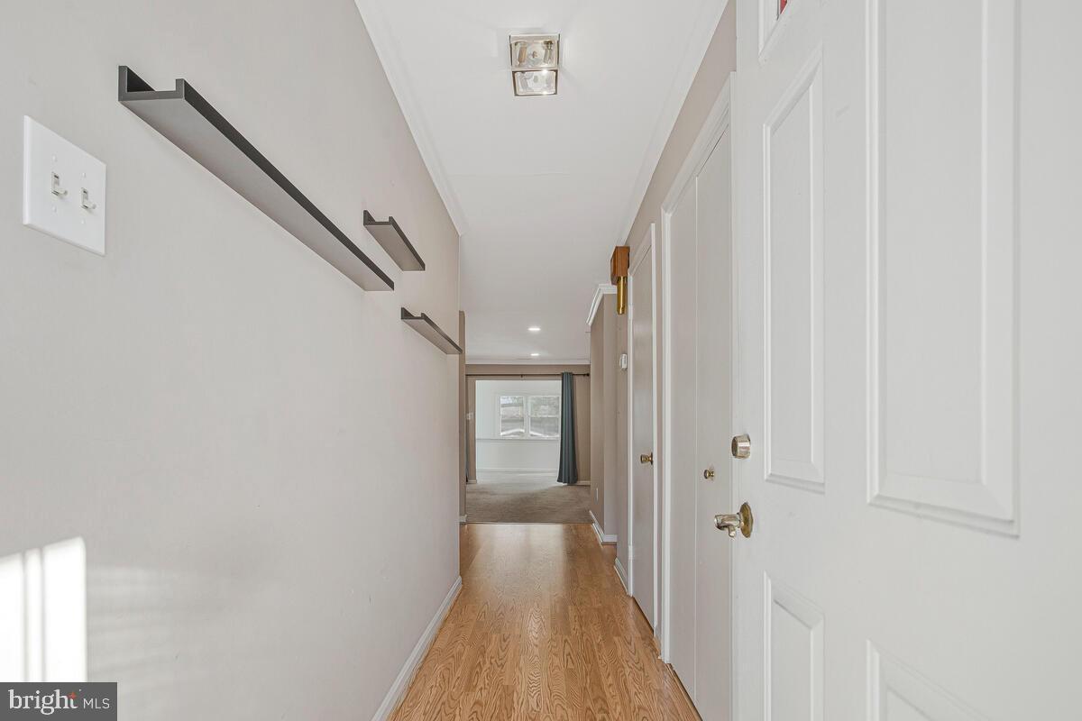 9264 Cherry Lane, Unit 47 Laurel, MD 20708 - Photo 5 of 32 a view of hallway with stairs