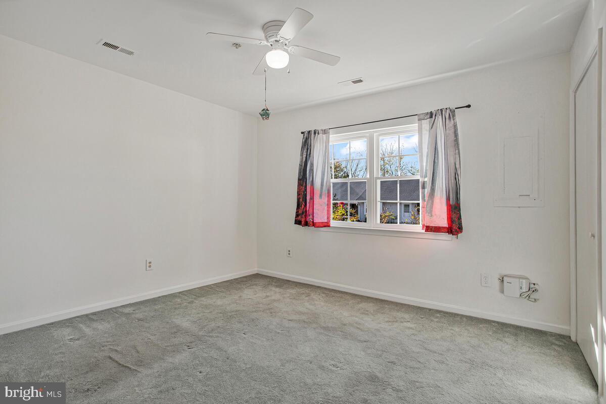 9264 Cherry Lane, Unit 47 Laurel, MD 20708 - Photo 7 of 32 a view of an empty room with a window