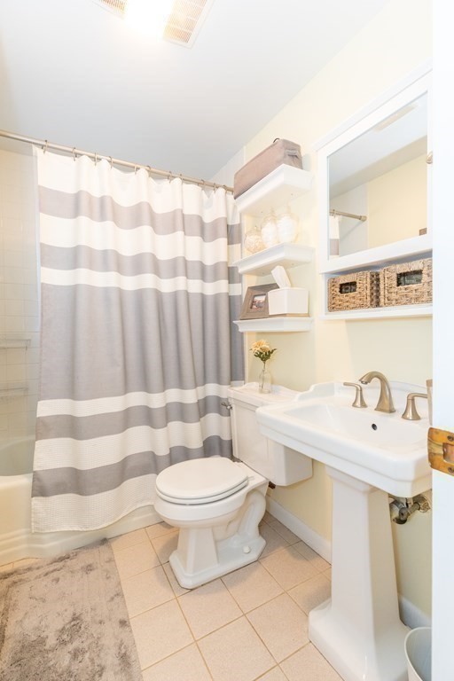 33 Keyes Road Westford, MA 01886 - Photo 21 of 42 a bathroom with a sink toilet and shower