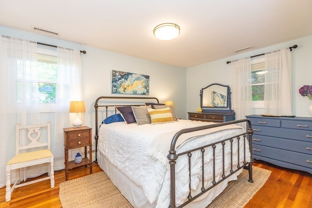 33 Keyes Road Westford, MA 01886 - Photo 22 of 42 a bedroom with a large bed and a window