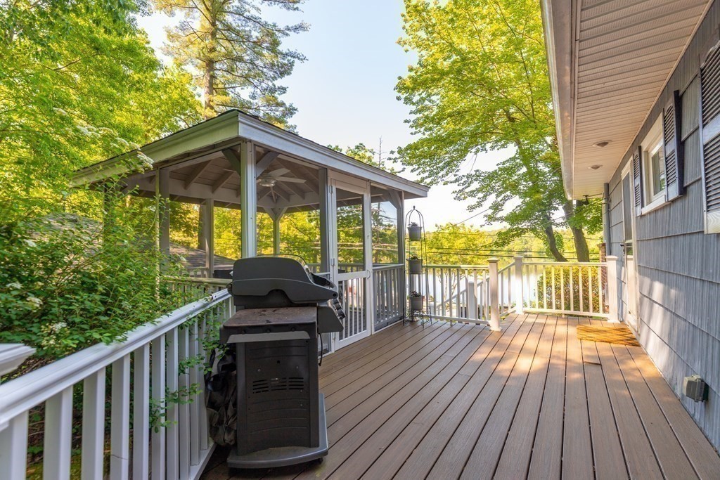 33 Keyes Road Westford, MA 01886 - Photo 25 of 42 a view of a deck with wooden floor and outdoor space