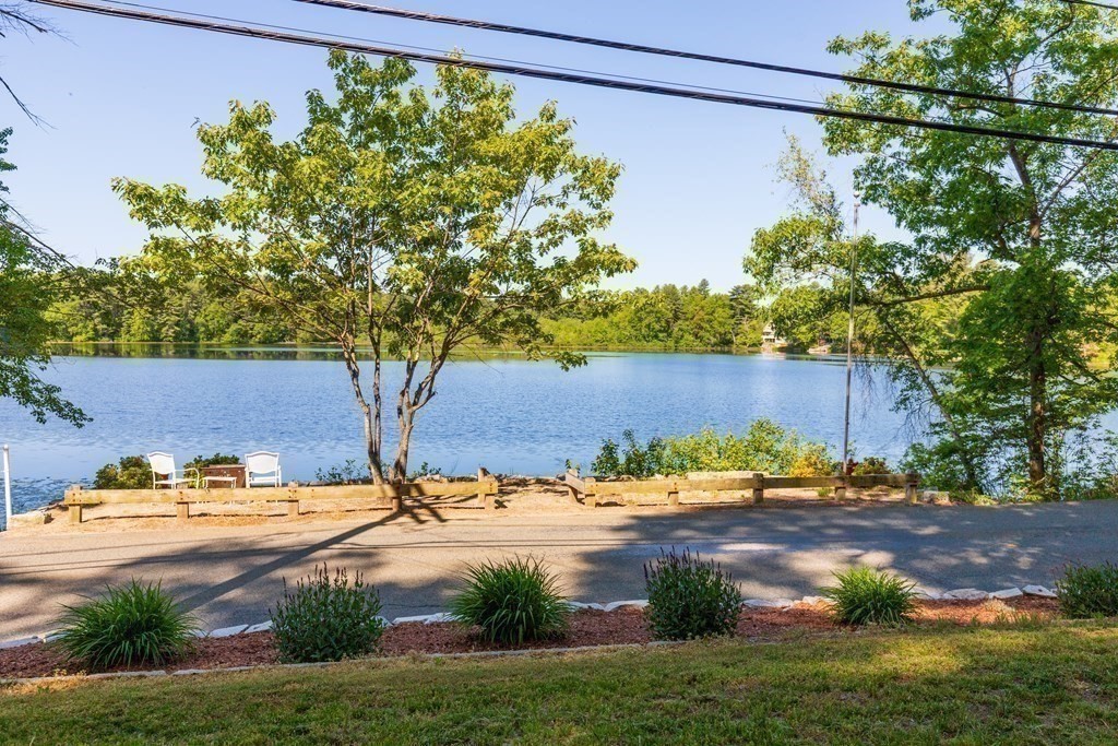 33 Keyes Road Westford, MA 01886 - Photo 33 of 42 a view of a yard with an outdoor space
