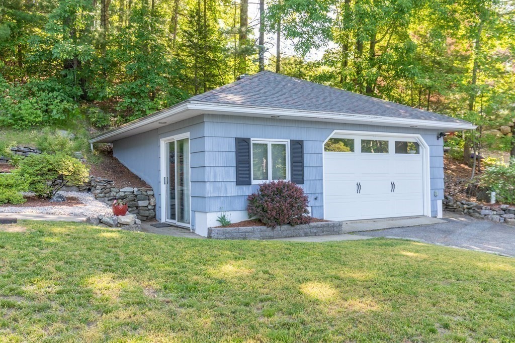 33 Keyes Road Westford, MA 01886 - Photo 37 of 42 a view of a house with backyard and garden