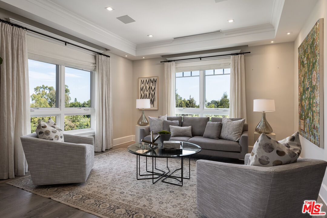 624 North Bonhill Road Los Angeles, CA 90049 - Photo 18 of 48 a living room with furniture and a large window