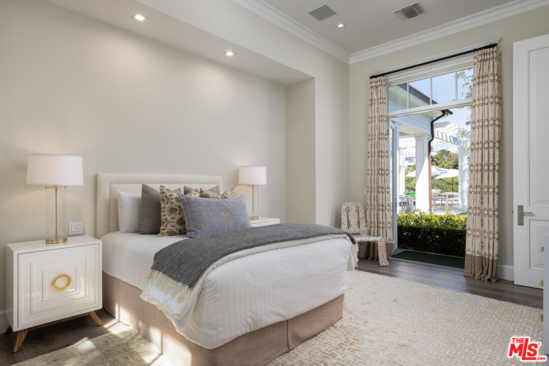 624 North Bonhill Road Los Angeles, CA 90049 - Photo 37 of 48 a bedroom with a bed and a window