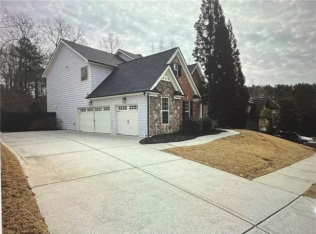 front view of a house with a yard