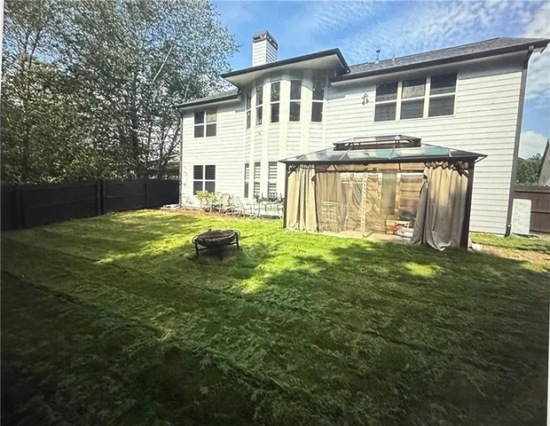 a house view with a outdoor space