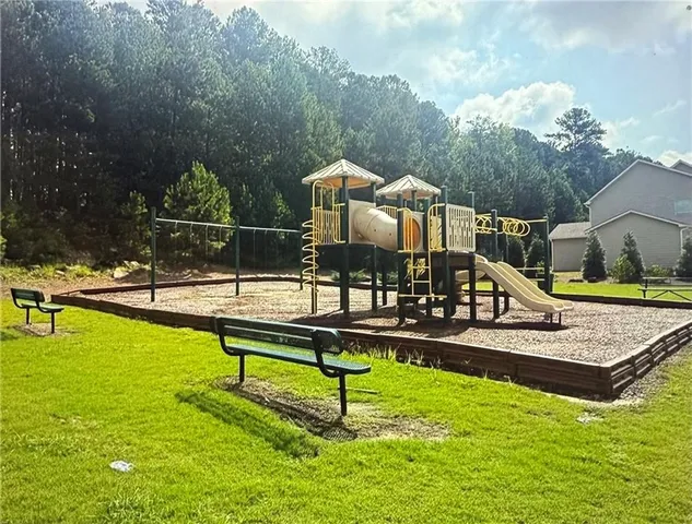 a view of a house with swimming pool