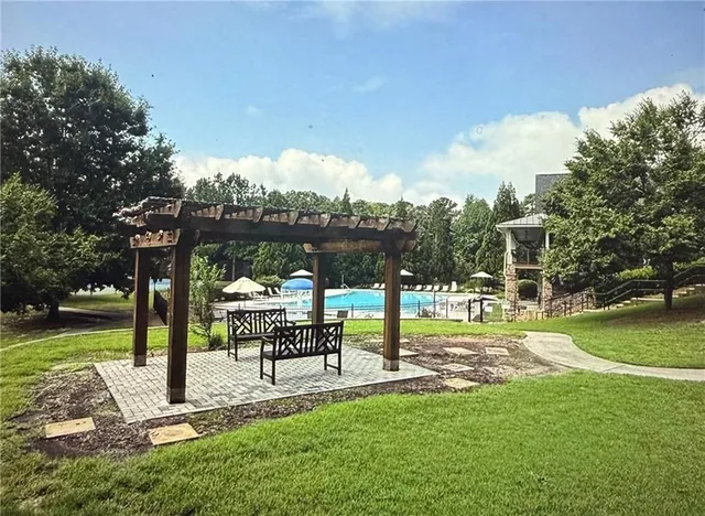 a view of a park with swings