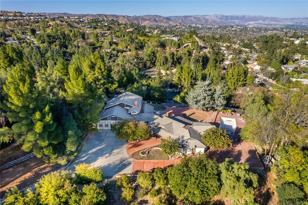 6006 Clear Valley Road Hidden Hills, CA 91302 - Photo 10 of 10 an aerial view of residential house with outdoor space and trees all around