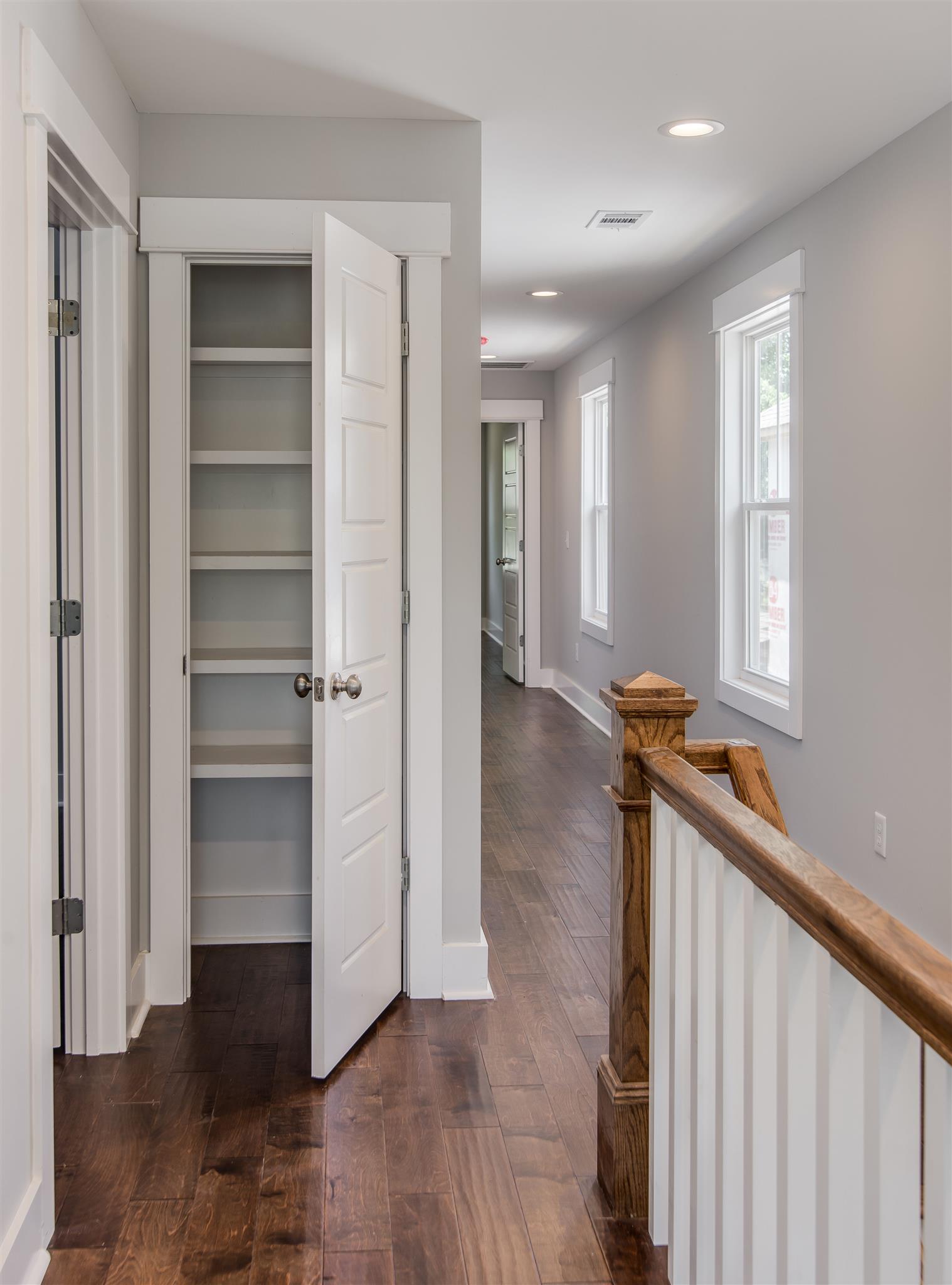 603 B Ries Avenue Nashville, TN 37209 - Photo 11 of 25 a view of hallway with window and wooden floor