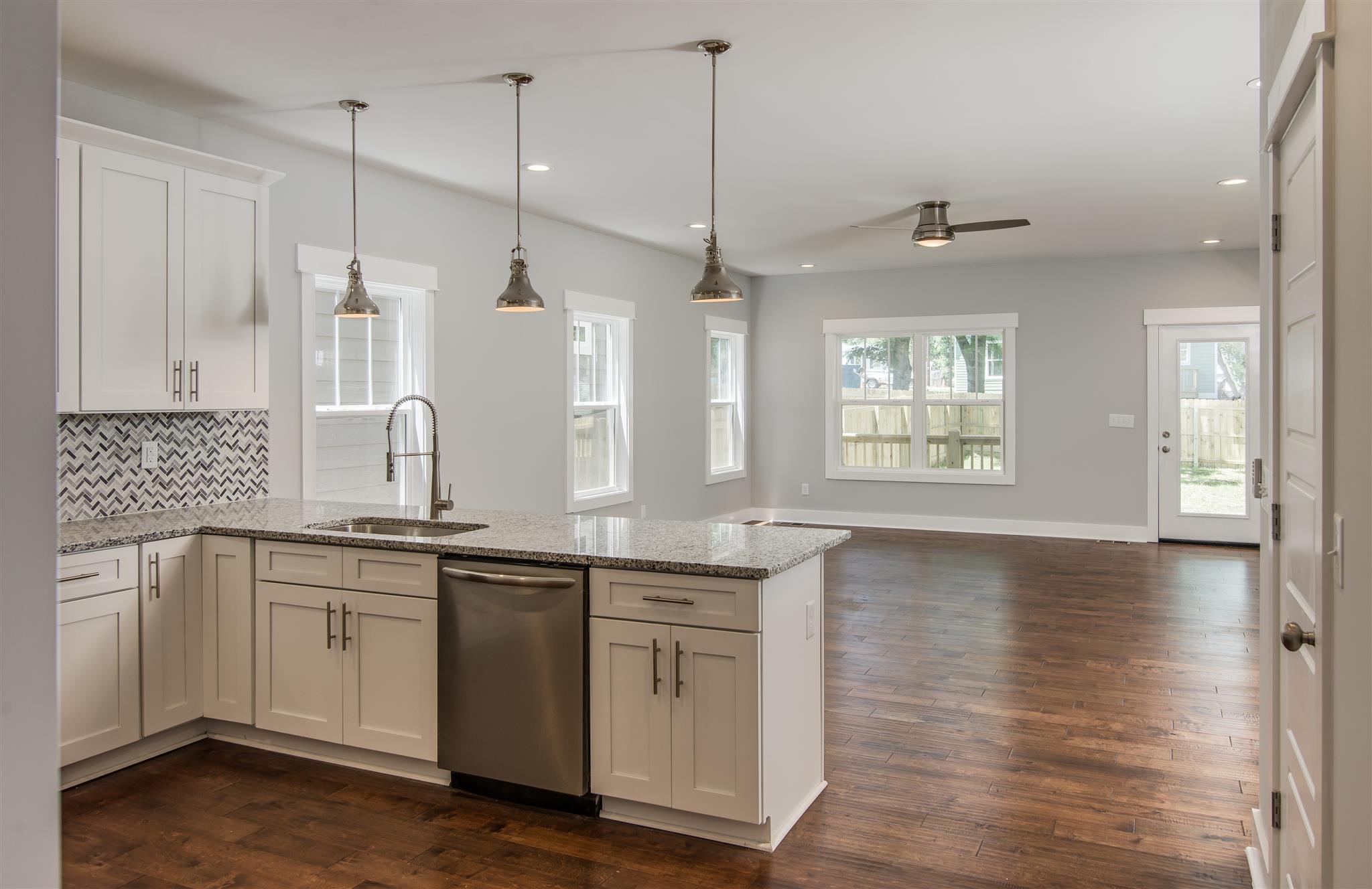 603 B Ries Avenue Nashville, TN 37209 - Photo 4 of 25 a kitchen with a sink stove and cabinets