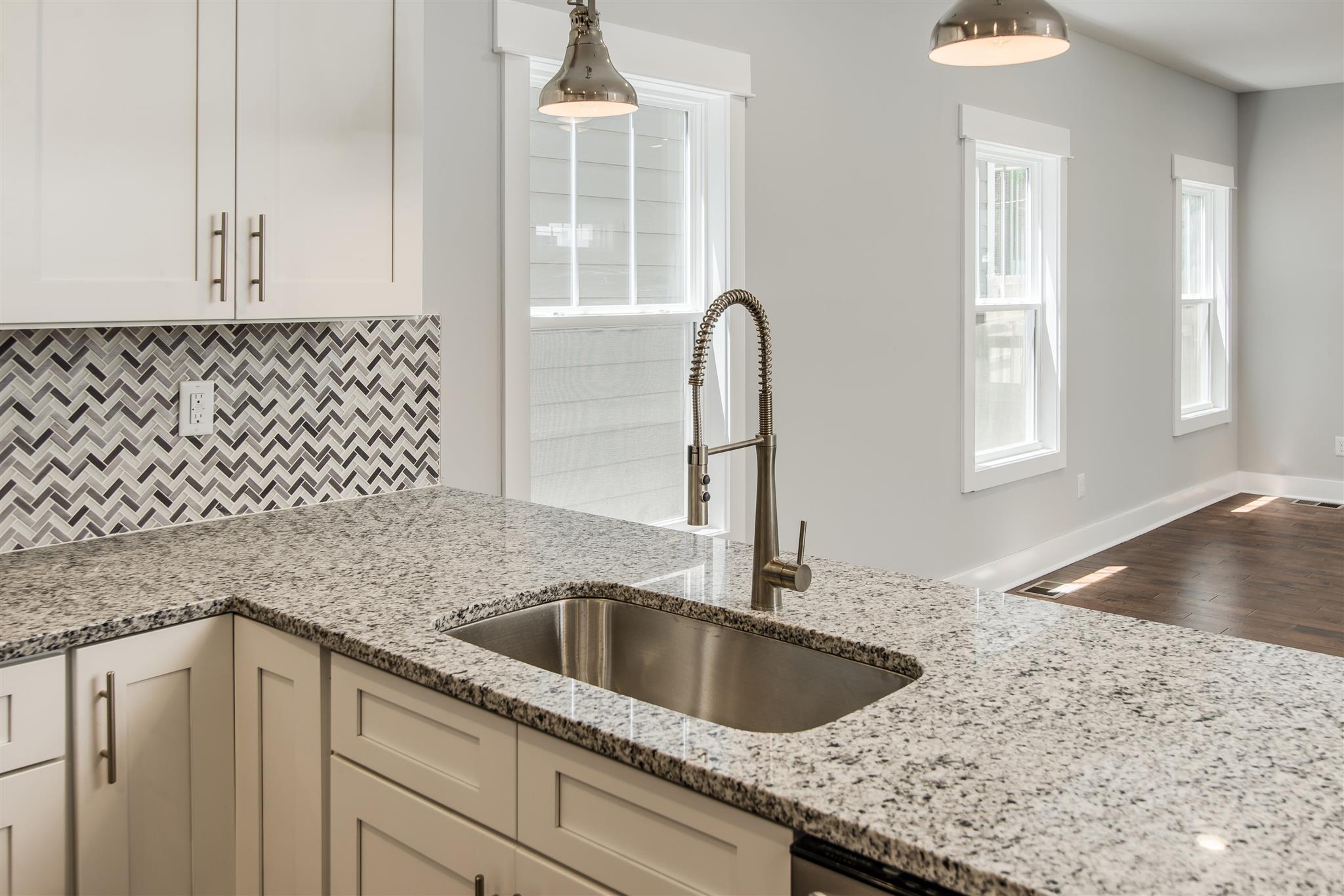 603 B Ries Avenue Nashville, TN 37209 - Photo 9 of 25 a kitchen with a sink and cabinets