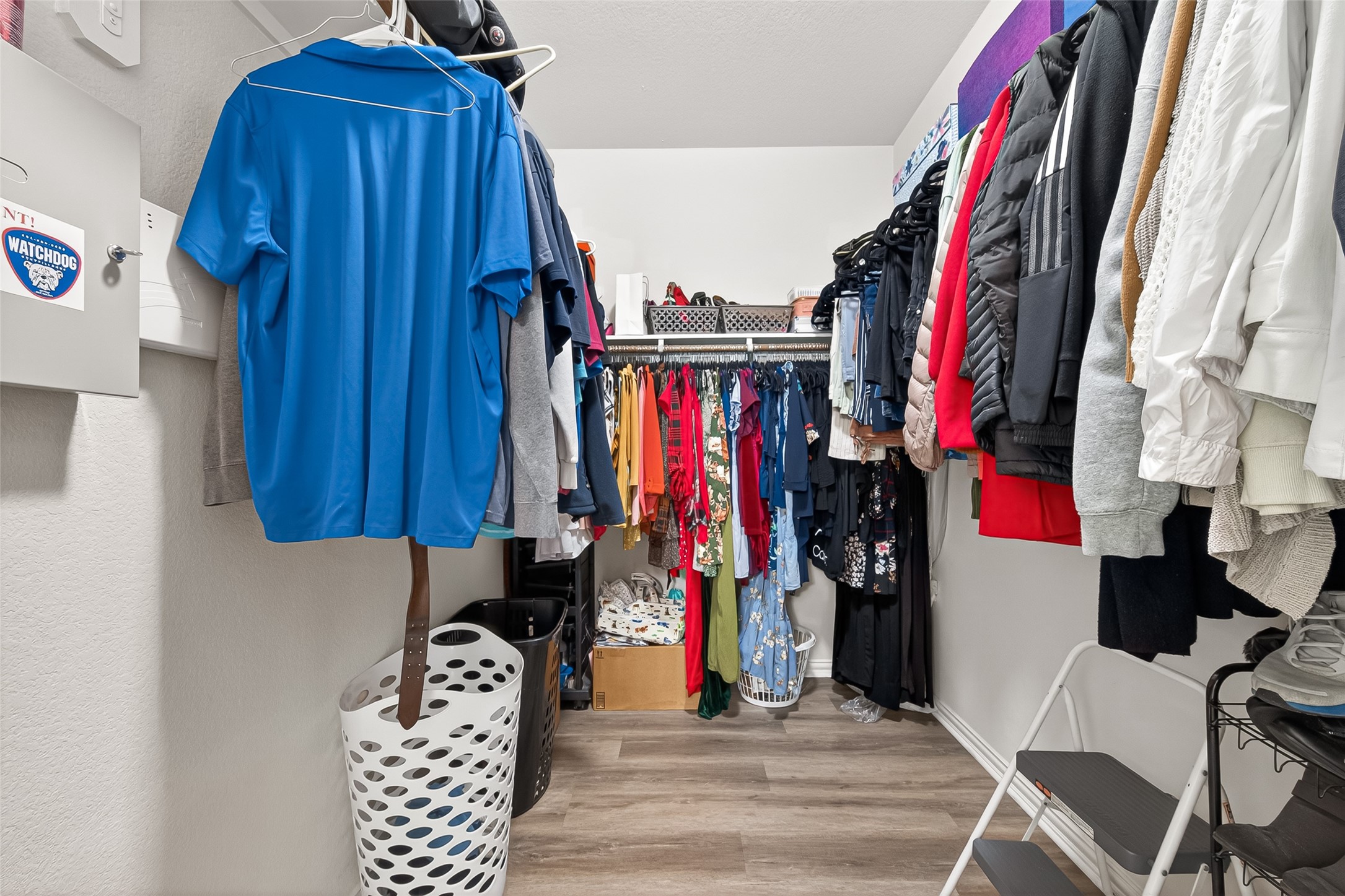 8 Landscape Court Conroe, TX 77301 - Photo 28 of 43 a view of walk in closet with clothes and shoes