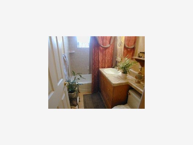 1532 Kooser Road San Jose, CA 95118 - Photo 4 of 9 a bathroom with a sink and a mirror