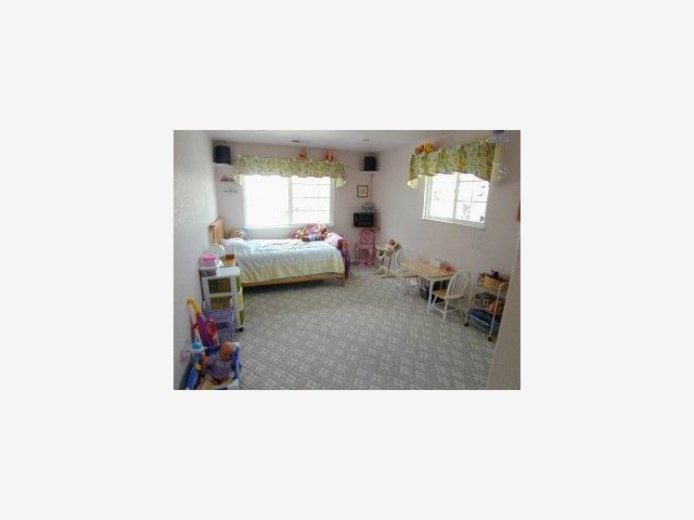 1532 Kooser Road San Jose, CA 95118 - Photo 6 of 9 a living room with furniture and a window