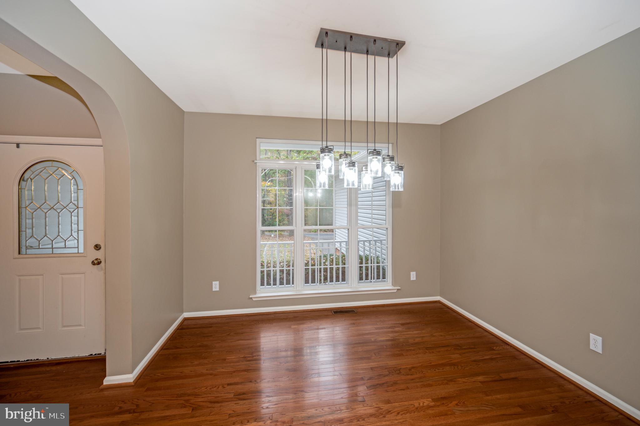 110 Battlefield Road Locust Grove, VA 22508 - Photo 6 of 42 Large window in DR allows for natural lighting