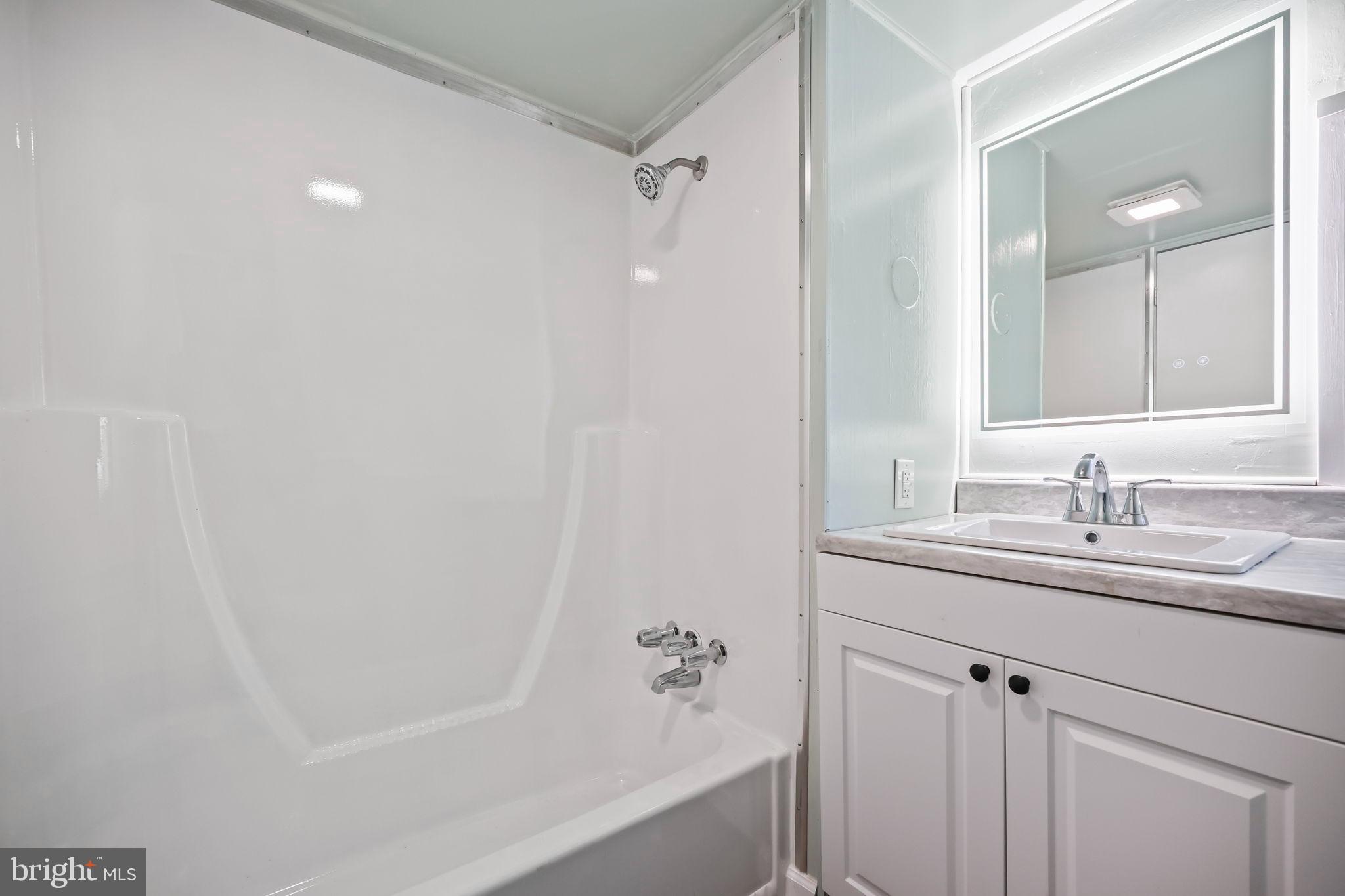 3610 Weymouth Road, Unit A Browns Mills, NJ 08015 - Photo 16 of 28 Sleek modern bathroom with elegant finishes.