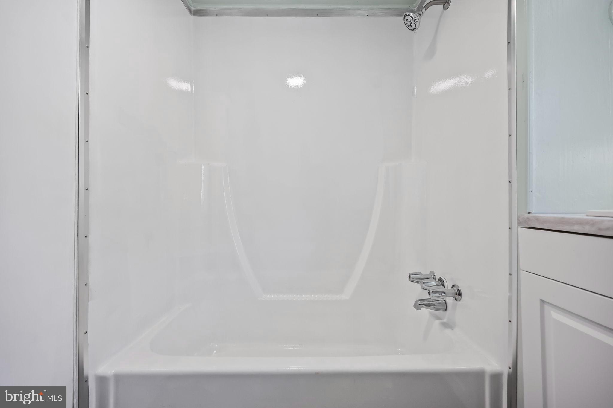 3610 Weymouth Road, Unit A Browns Mills, NJ 08015 - Photo 17 of 28 Sleek and modern shower space awaits you.