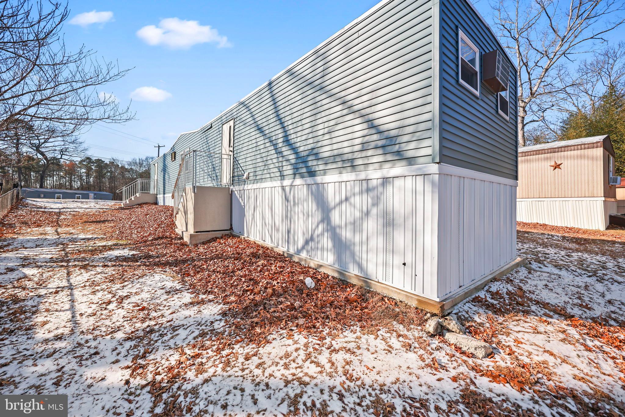 3610 Weymouth Road, Unit A Browns Mills, NJ 08015 - Photo 23 of 28 Charming home nestled among autumn leaves.