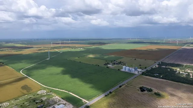 a view of a lake with a yard