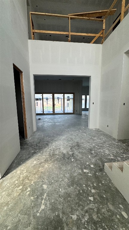 65 Shadow Creek Ridge Drive Spring, TX 77389 - Photo 24 of 35 a view of an empty room with a fireplace and a window