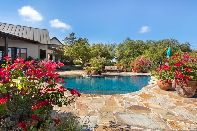 a view of a house with a swimming pool