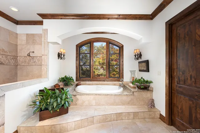 a bed room with furniture and a fireplace