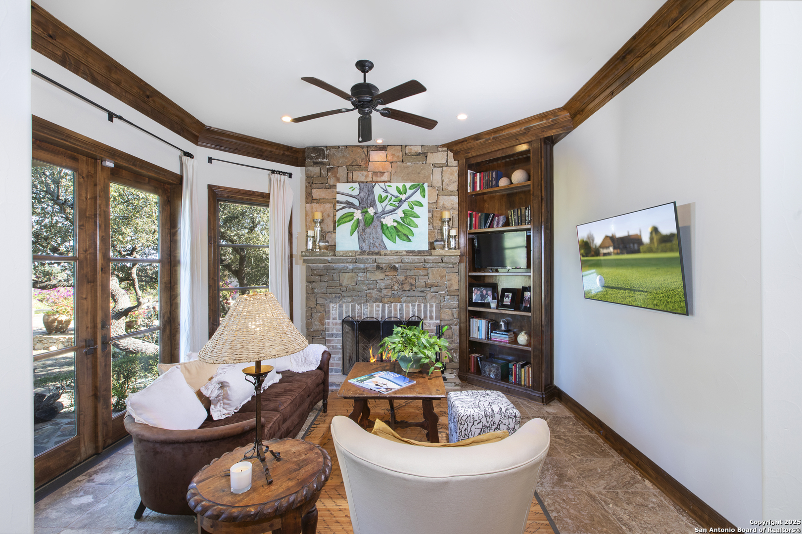 165 Painted Sky Comfort, TX 78013 - Photo 25 of 49 a living room with fireplace furniture and a potted plant