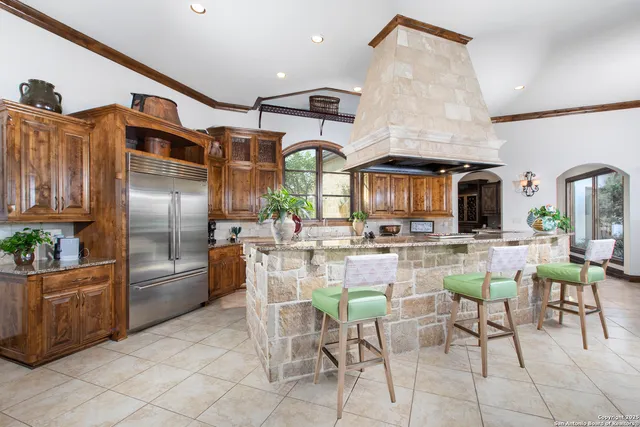 a living room with lots of furniture and appliances